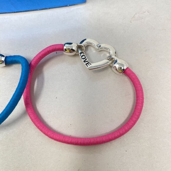 Avon Symbolic Bracelets Set of 2 Pink Love Believe Blue Stretch Silver-Tone - Picture 3 of 11
